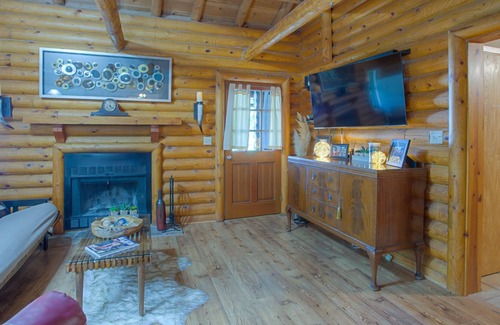 Enchanted Oaks Cabin | Authentic log cabin on Cedar Creek Lake - spectacular views from all 3 decks
