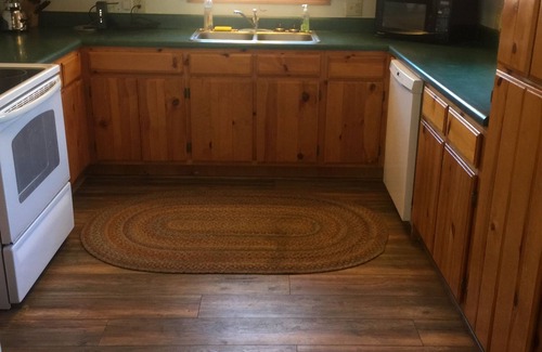 Greer Cabin | Awesome 4BR-2BA on Main Street! Huge porch, Stocked Trout Pond, Wood stove.