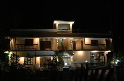 Thalassery Hotel | Ayush Green - Home Away Home