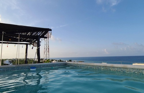 Isla Mujeres House | B&B for a Farm to Table local experience and a roof top view of the Caribbean