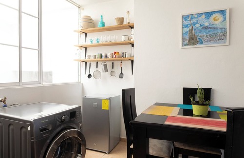 Banos de Agua Santa Apartment | Baños Downtown Comfy apartment - work area & laundry