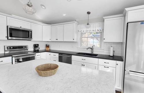 Indian Neck Heights House | BACK ON THE RENTAL MARKET! 3BD Indian Neck Beauty-A/C, Water Views, Steps to Burton Baker Beach