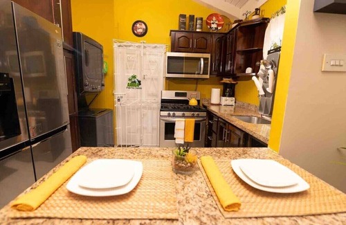Mammee Bay House | Backyard Oasis in Drax Hall 70in TV