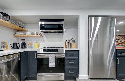 Loyal Heights Apartment | Ballard Luxury Contempo Flat w/Sauna & EV Charger