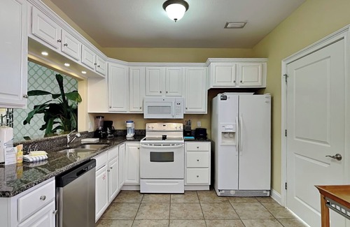 Sunset Pass House | Banana Bay Townhome 6075 | Pet-Friendly, Short Drive to Beach, On-Site Amenities