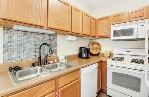 Pigeon Forge Apartment | Bandit's Riverfront Retreat - Mountain View- Condo-Fishing-Balcony-Fireplace-Great Location!