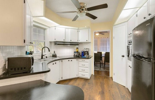 Micco House | Barefoot Bliss. Enjoy Barefoot Bay Amenities. Lake view. Steam shower & grill.