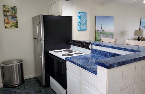 Midtown Ocean City Condo | BAY FRONT - Beautiful Sunsets - Walking distance to Beach, Shops, Eateries.