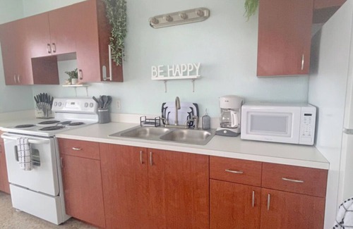Orange Grove Condo | Bay Garden Bliss-Ocean Views