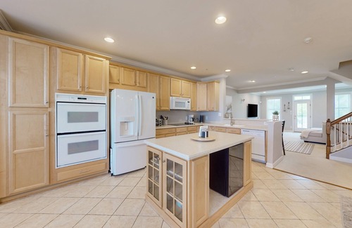 Sunset Island House | Bay view townhome with multiple decks, pool & gym - walk to the beach