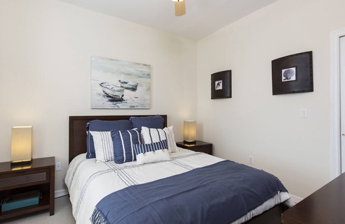 South Padre Island Condo | Bayfront Condo with Amazing Views, Waterfront Pool/Hot Tub, & Boat Slip!