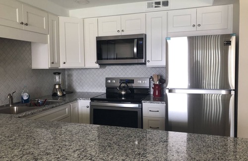 Midtown Ocean City Condo | Bayfront Condo overlooking water! Across the street from the Beach!