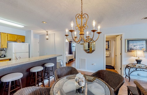 Orange Beach Condo | Bayfront condo with boat slips/launch, pool, tennis, & fishing pier - near beach