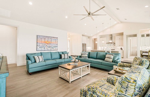 Rockport House | Bayfront water-view home with outdoor pool, lovely patio, hammock, fishing dock