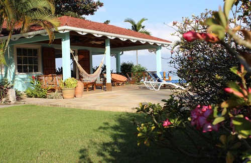 Runaway Bay Villa | Baywatch - seaside villa, modern, spectacular location & garden, pool, cook
