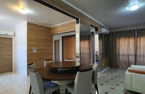 Canto do Forte Apartment | Beach apartment with side views of the sea and mountains