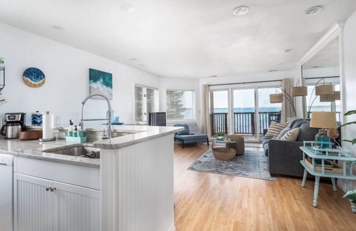 Traverse City Condo | Beach Bliss 211 Balcony Water Views Beach Downtown
