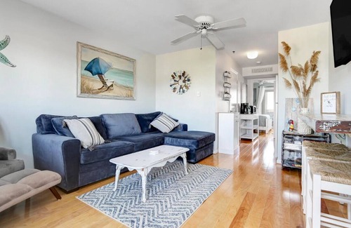 Southend Condo | Beach Block! Beautifully furnished 1 bed/1 bath steps to the sand