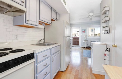 Southend Condo | Beach Block! Beautifully furnished 1 bed/1 bath steps to the sand