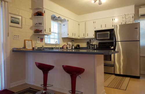 Savannah Beach Apartment | Beach-Chic Apt. for Two - SLEEP NUMBER BED - Porch Rockers - Short Walk to Beach