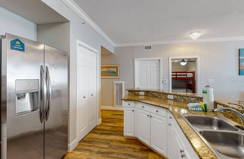 Panama City Beach Condo | Beach-chic corner condo with gorgeous Gulf views, pools, hot tub & game room