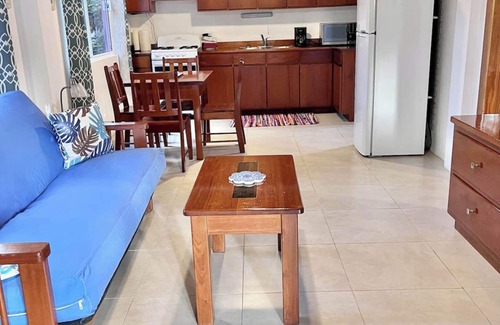 Caye Caulker Apartment | Beach Cottage AC/pool/dock beach- free paddle boards-sleeps 4