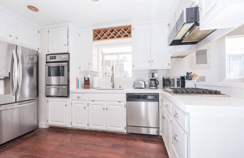 West Newport Condo | Beach Cottage of Your Dreams! | One Block to Beach | Fabulous Patio | Charming Details Throughout