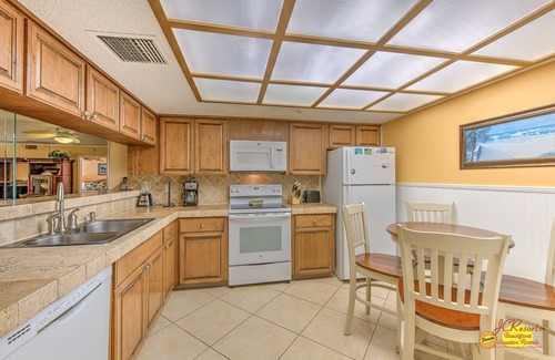 Indian Shores Condo | Beach Cottage111 Baby Friendly 3 Bedroom 2 Bath Condo with Walk-Out to Pool.