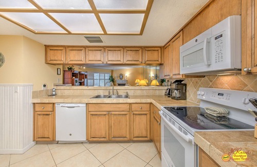 Indian Shores Condo | Beach Cottage111 Baby Friendly 3 Bedroom 2 Bath Condo with Walk-Out to Pool.