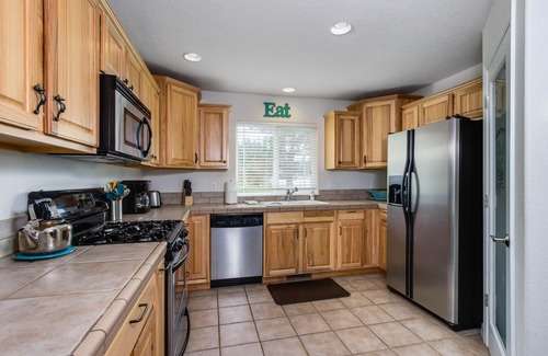 Lincoln City House | Beach escape with patio, private hot tub, & game room - steps to beach