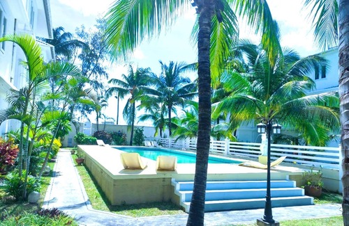 Wolmar Apartment | Beach front- Cozy 3-bedroom apartment in wonderful Flic en Flac with WiFi, AC