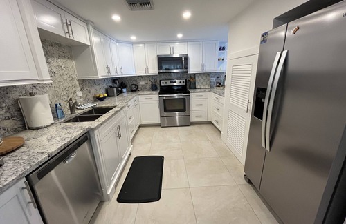 West Bay Condo | Beach front unit 2 bedroom/2 bath - steps to the beach or pool! Sleeps 5.