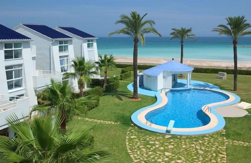 Molinell Villa | Beach front villa in a family friendly small community with pool
