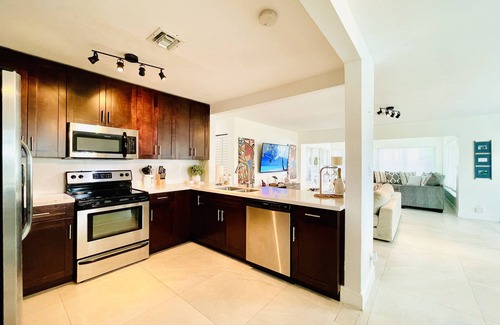 Dolphin Isles House | Beach House-Game room-Downtown-Heated Pool-HotTub