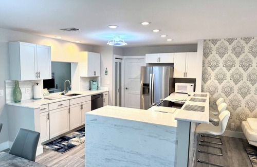Singer Island House | Beach house in Paradise! Renovated throughout with pool. Steps to the beach