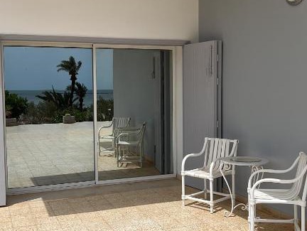 Sidi Fredj Apartment | Beach house wing in kerkennah island. Fully equipped place for 4 guests and peaceful relaxing stay. Calm sea and beautiful sun rise that can be enjoyed straight on the beach or from the house terrace.