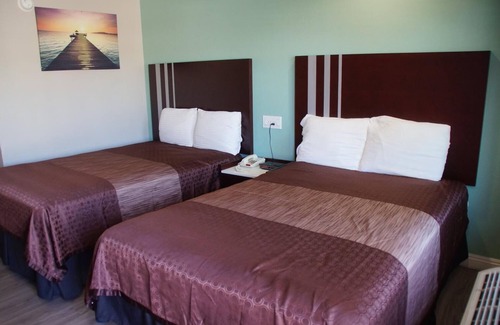 East Village Hotel | Beach Inn Motel
