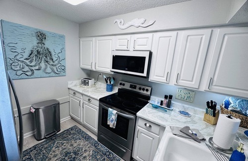 Gulf Lagoon Beach Condo | "Beach Please" PCB - Small Pet Friendly 2/2 Condo ON Beach! FREE Beach Chair Svc
