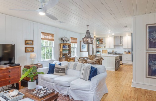 Tybee Island House | Beach Therapy: Stylish Cottage with Private Courtyard, Wrap-Around Porches, and Modern Decor.