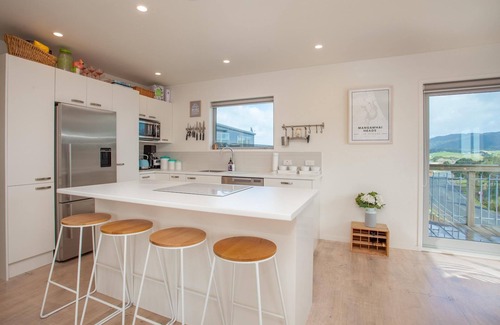 Mangawhai Heads House | Beach Time - Modern, sunny home close to amenities, a great place to relax and watch the kids play