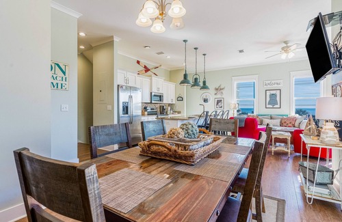 Gulf Shores Cottage | Beach-view cottage near beach with pool, wrap-around balcony, boat dock, W/D, AC