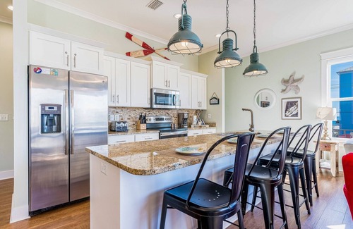 Gulf Shores Cottage | Beach-view cottage near beach with pool, wrap-around balcony, boat dock, W/D, AC