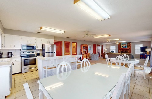 St. George Island House | Beach view home with a pool, hot tub, covered deck, washer/dryer & central AC