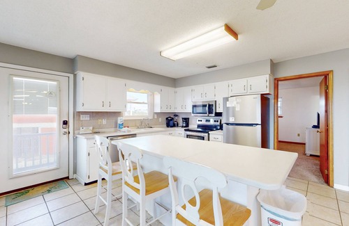 St. George Island House | Beach view home with a pool, hot tub, covered deck, washer/dryer & central AC