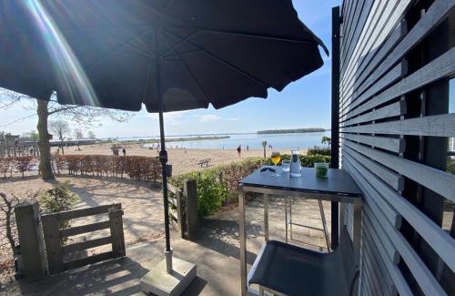 Hulshorst Villa | BEACH VILLA in erster Reihe - direkter Strandzugang - eingezäunter Garten - Dachterrasse - 2 Gartenterrassen - Terrassendach - Grill mit Plancha - XXL Meerblick - Bar - SONOS Soundanlage - Pool Whirlpool - kinderfreundlich - Hunde willkommen