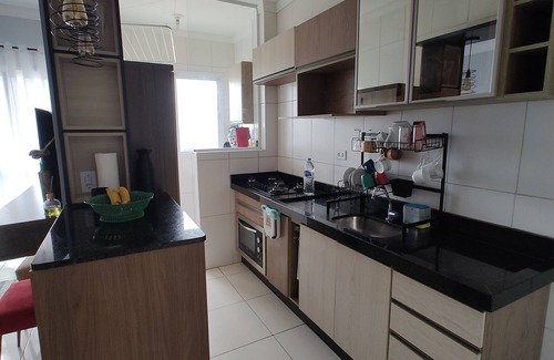 Praia Grande Apartment | Beachfront condominium, 1-bedroom apartment with views of the mountains and sunset