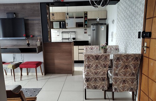 Praia Grande Apartment | Beachfront condominium, 1-bedroom apartment with views of the mountains and sunset