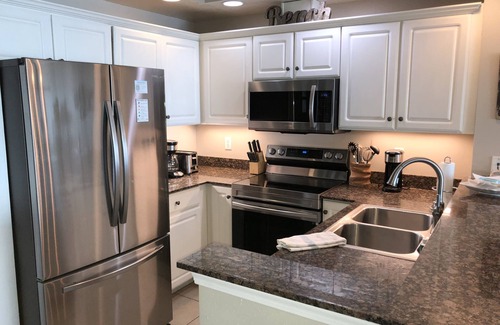 Gulf Shores Condo | Beachfront 2-bedroom condo just steps to Gulf Shores Beach! Gym, sauna and pool!