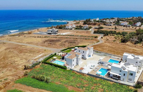 Pomos Villa | Beachfront 4 bed villa with sea views.