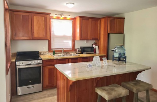 Caye Caulker Cottage | Beachfront abode with well-equipped kitchen - pool, beach, grill, & canoe access